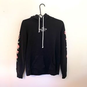 size small black hoodie with roses on side